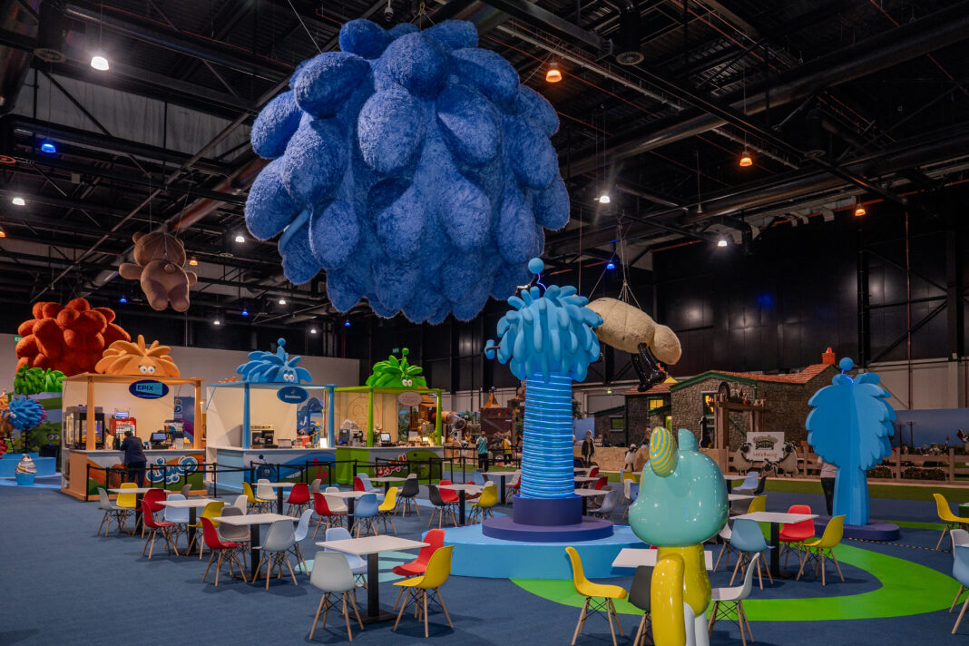 Wide view of Shaun the Sheep themed attractions at Bahrain Summer Toy Festival.