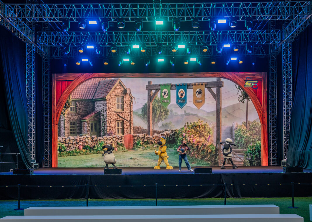 Main stage of Bahrain Summer Toy Festival featuring colourful festival branding.