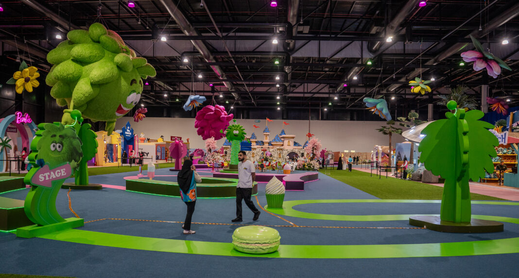 Colourful central entertainment zone at Bahrain Summer Toy Festival 2026.