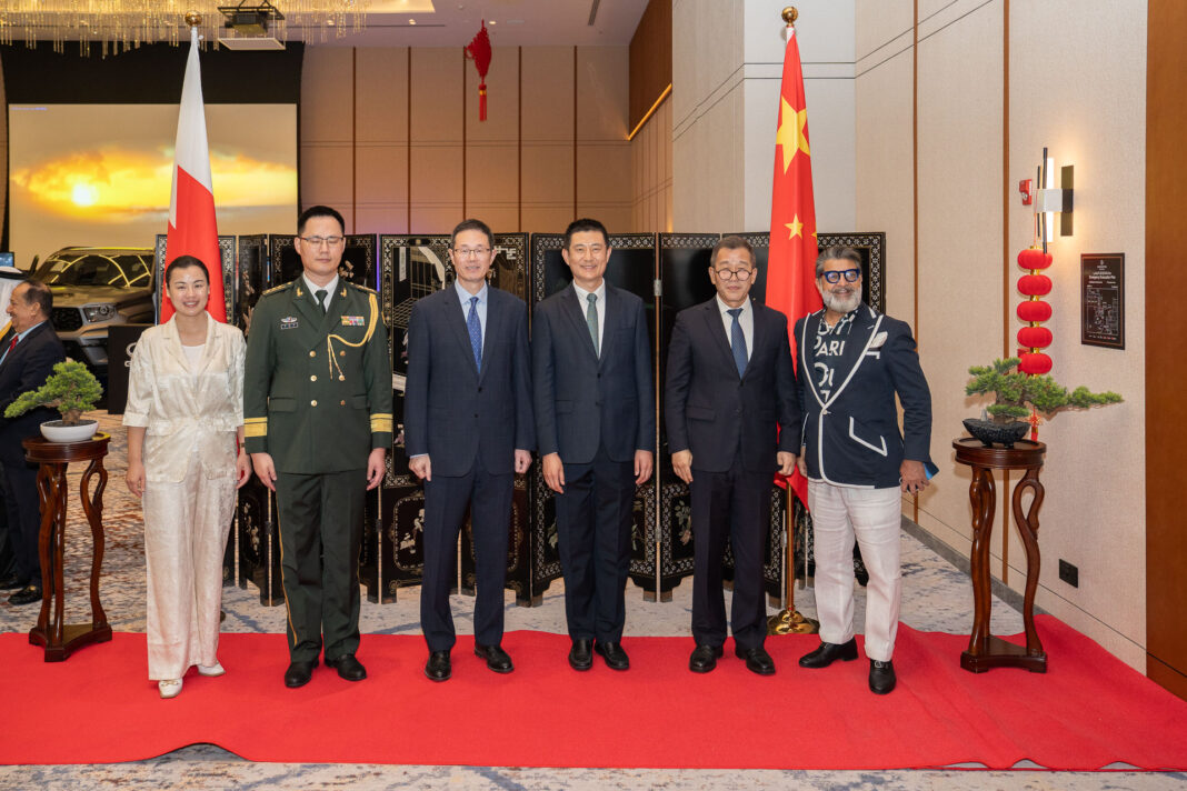 Chinese military representatives with guests.