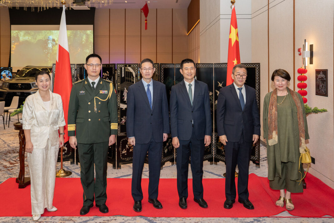Chinese military representatives with guests.
