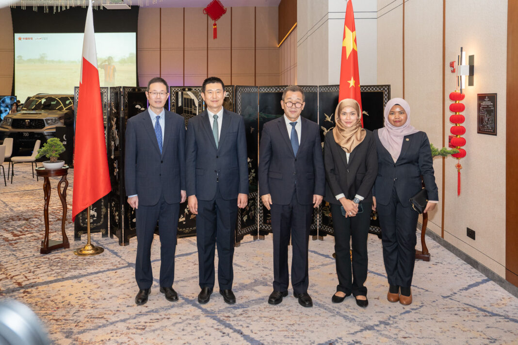 Chinese military representatives with guests.