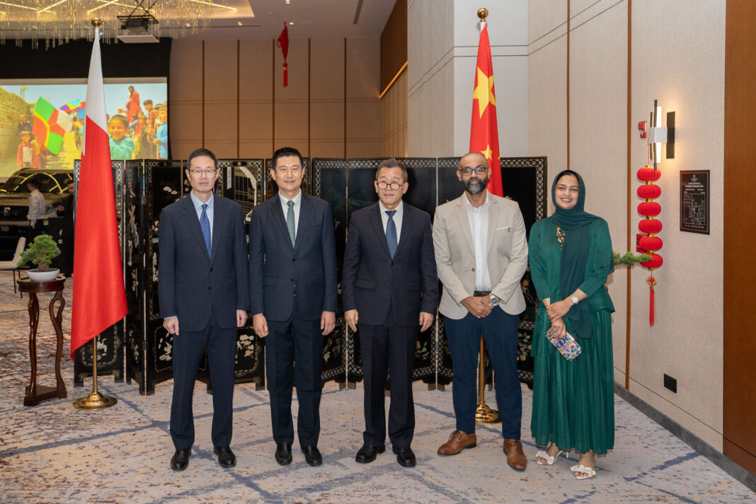Chinese military representatives with guests.