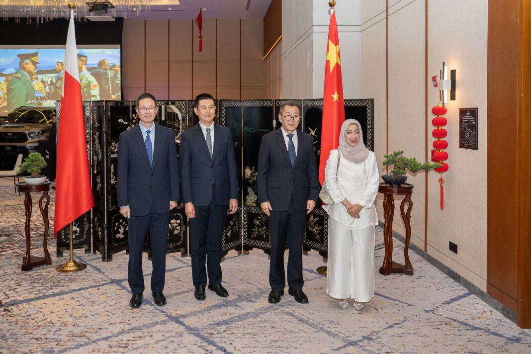 Chinese military representatives with guests.